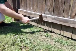 Installing Dig Guard For Pet Friendly Fence Security Comal Fence